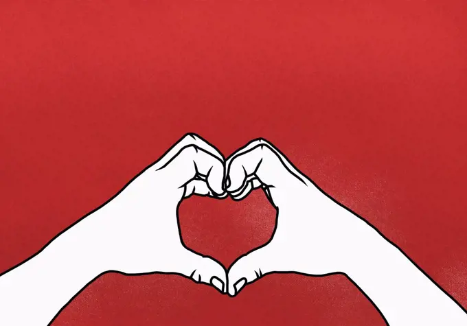 Cropped hands of person making heart shape against red background