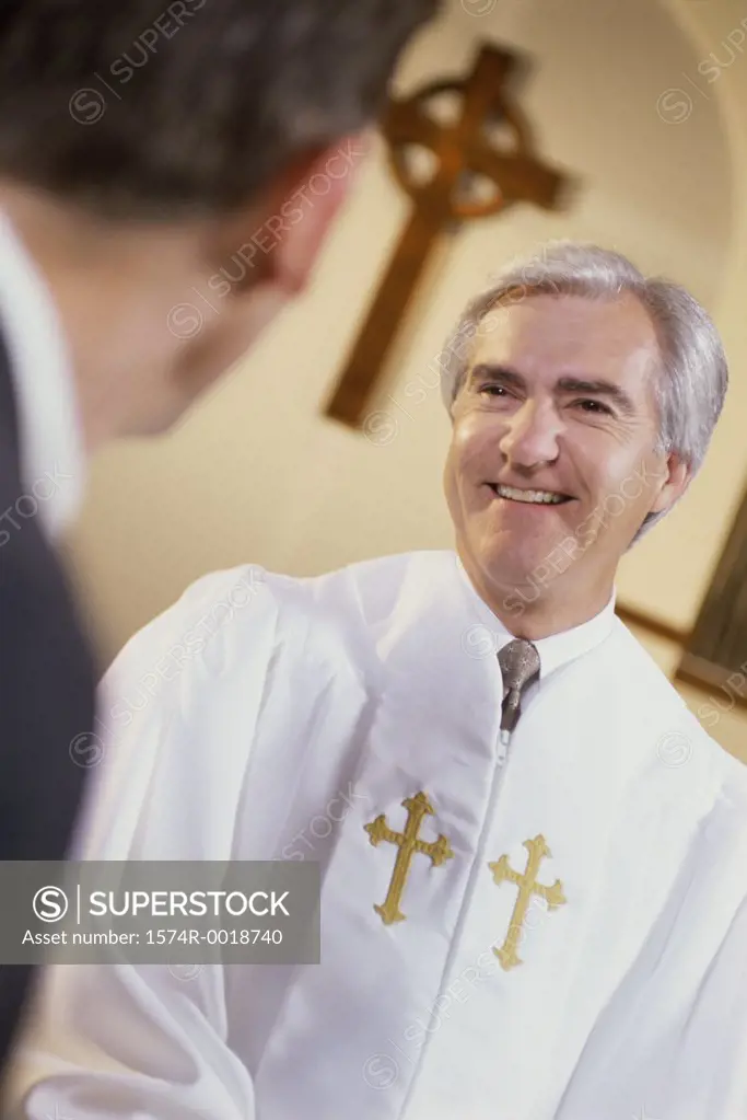 Priest talking to a man