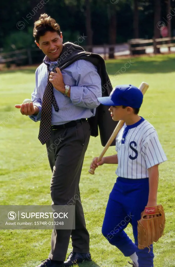 Father walking in the park with his son