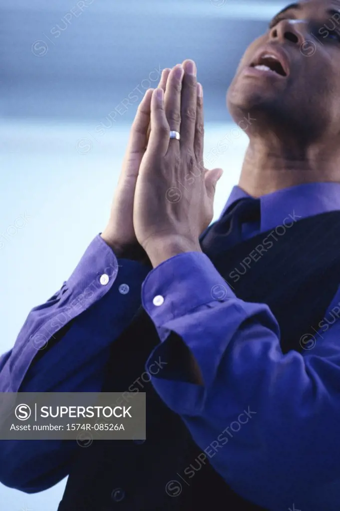 Businessman praying