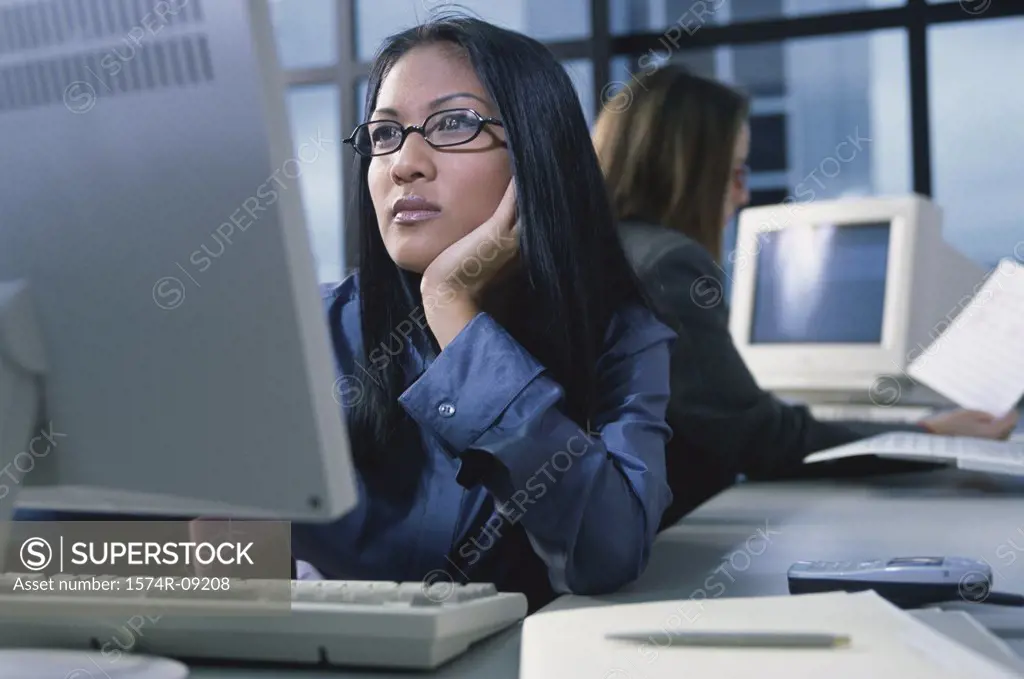 Businesswoman working on a computer in an office