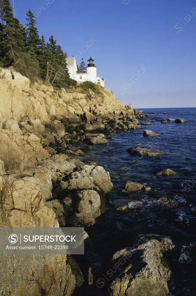 Lighthouse on a cliff, Bass Head Lighthouse, Mount Desert Island, Maine ...