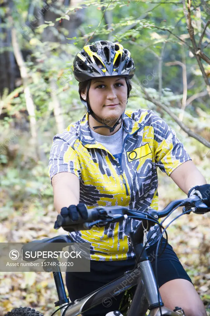 Portrait of a woman with a mountain bike