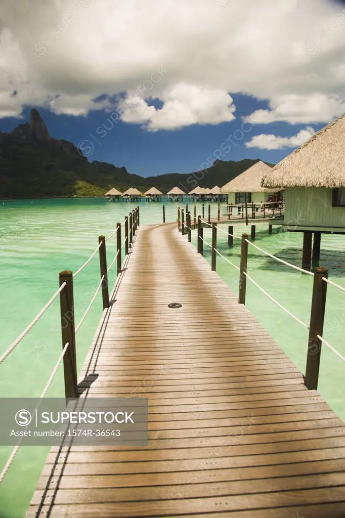 Beach huts along a pier, Bora Bora, Tahiti, French Polynesia