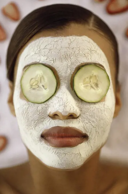 Close-up of a young woman wearing a facial mask