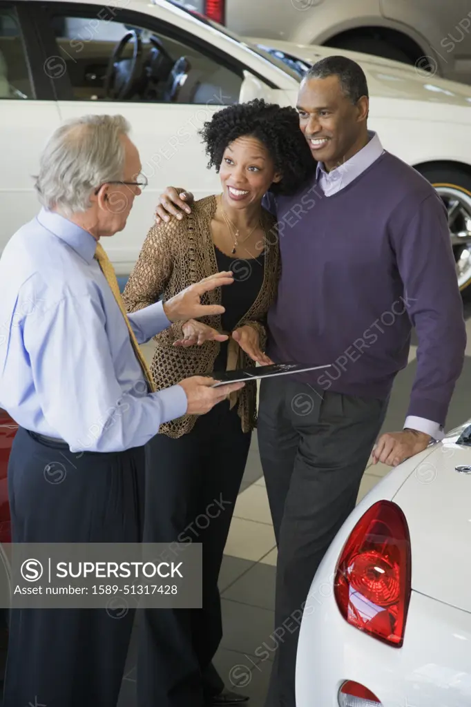 Couple buying a car