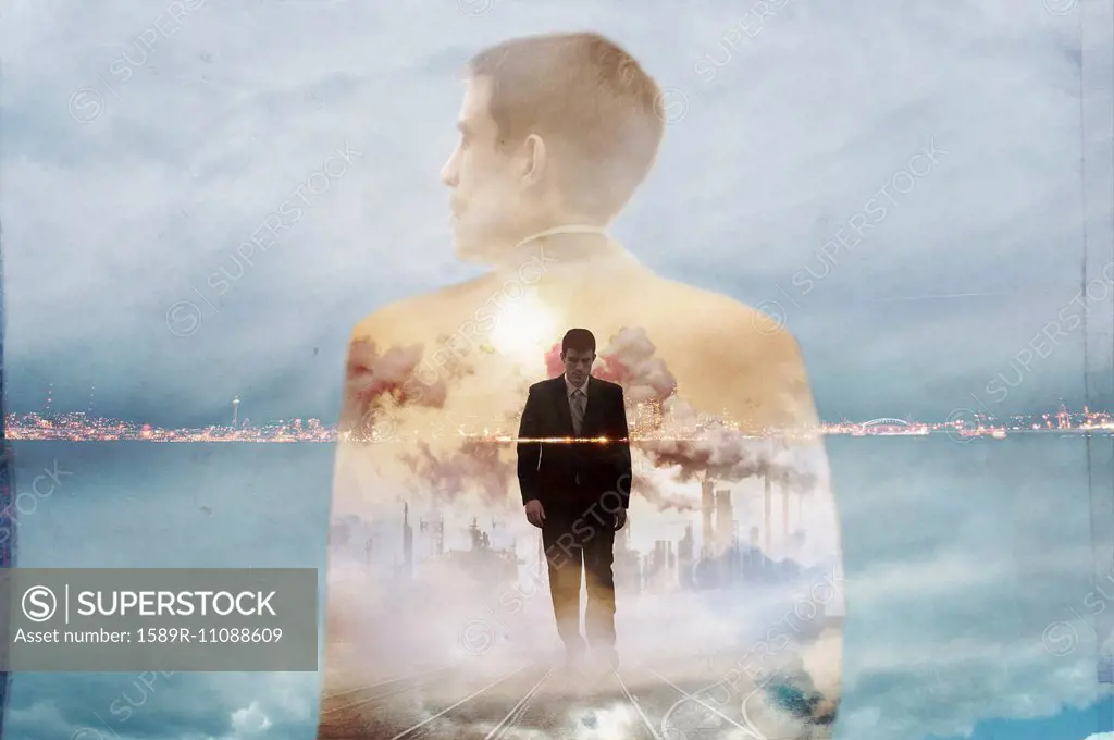 Double exposure of businessman and urban coastline