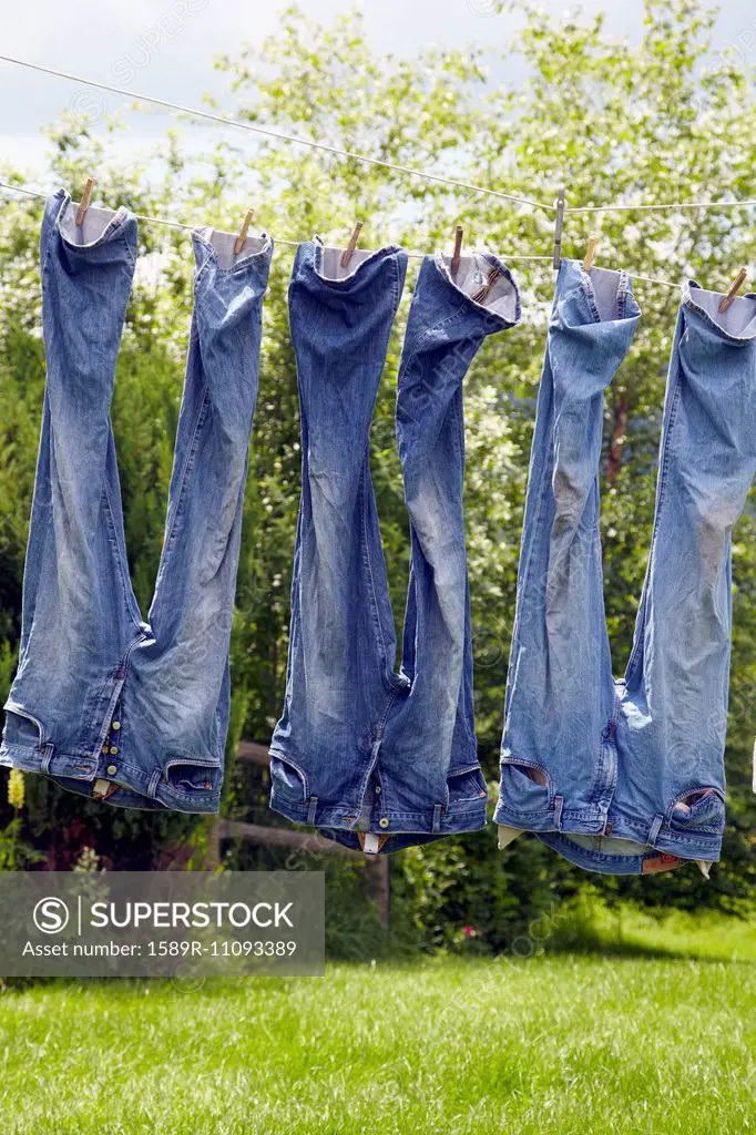 Jeans hanging from clothesline