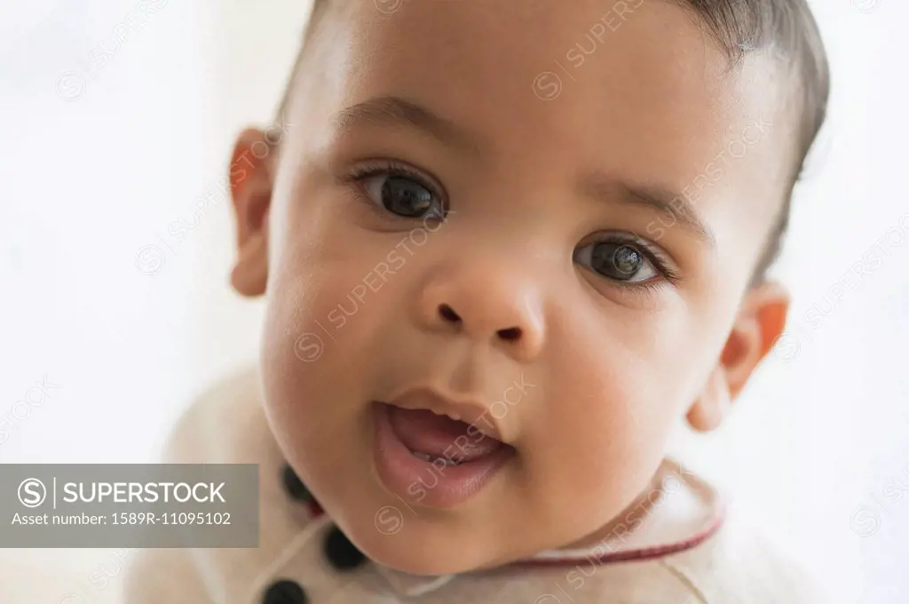 Close up of mixed race baby's face