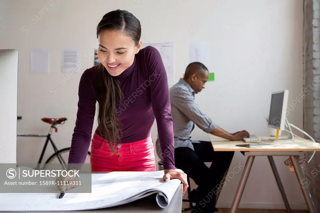 Architects working in office