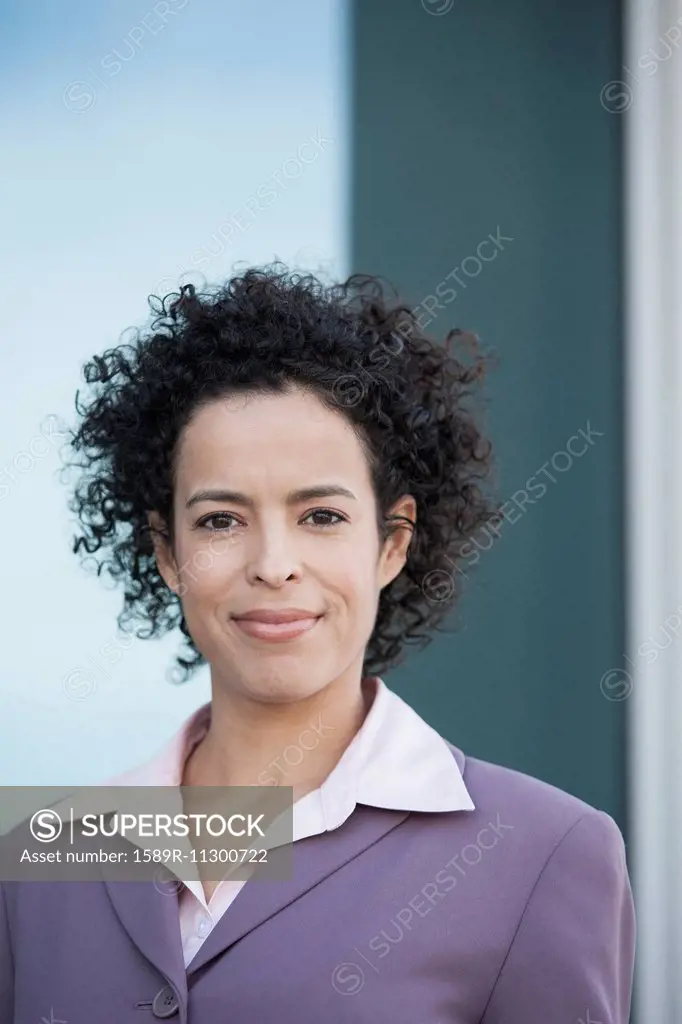 Hispanic businesswoman smiling