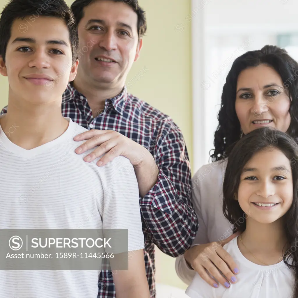 Hispanic family smiling