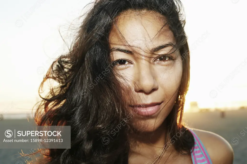 Close up of face of serious Hispanic woman