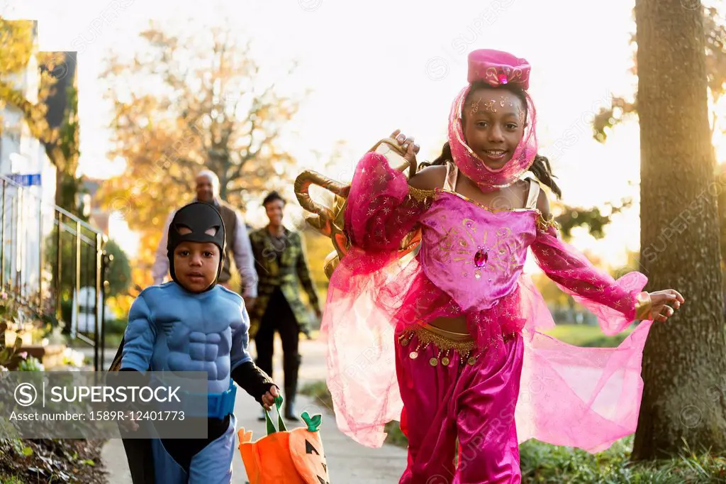 African American children trick-or-treating on Halloween