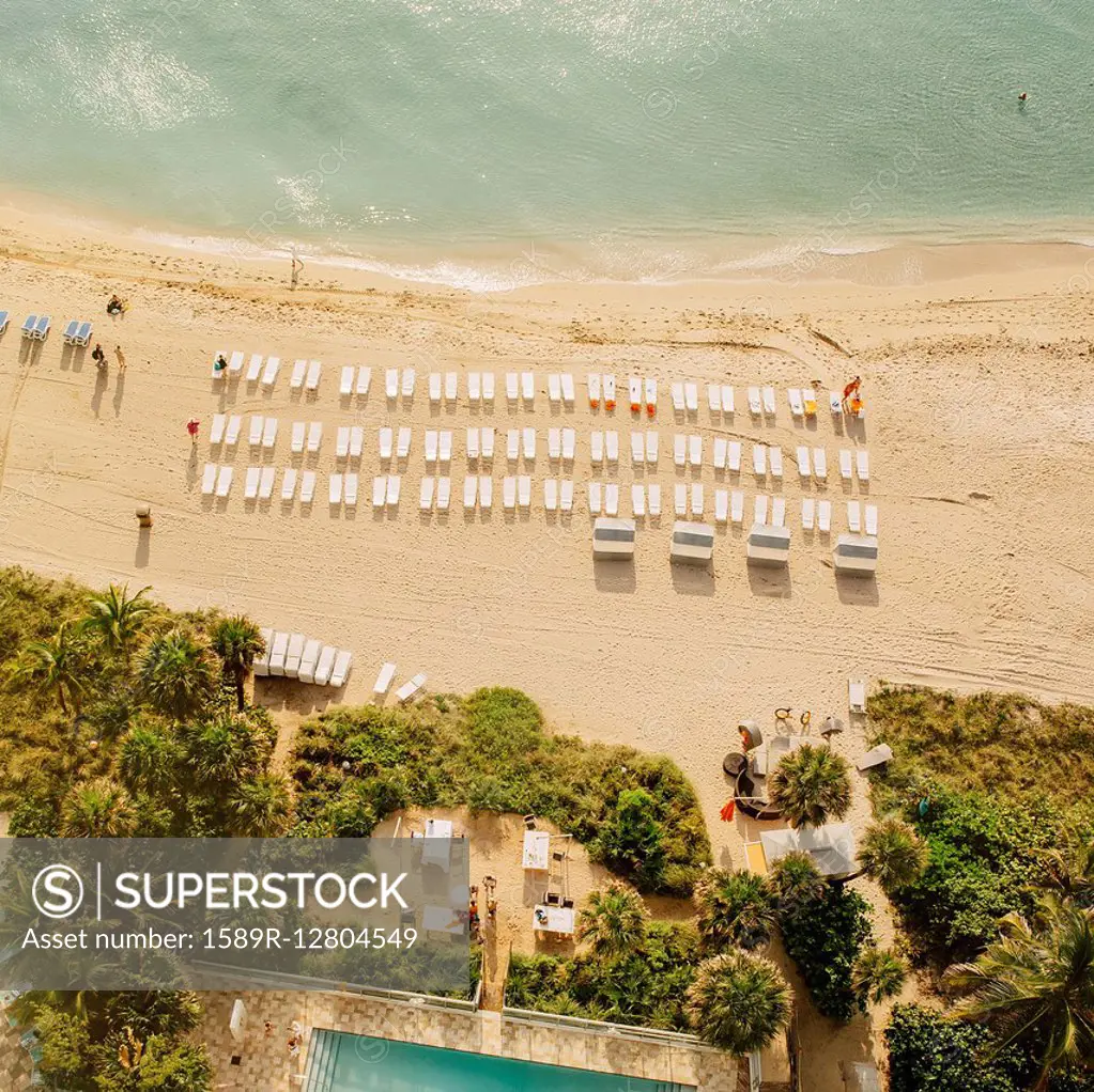 Aerial view of hotel pool and tropical beach