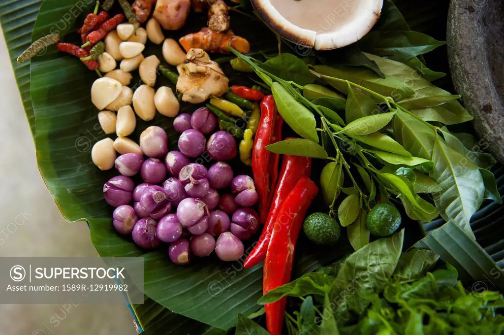 Close up of fresh produce and herbs on counter