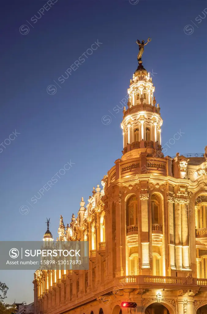 Illuminated historical building and sunset sky