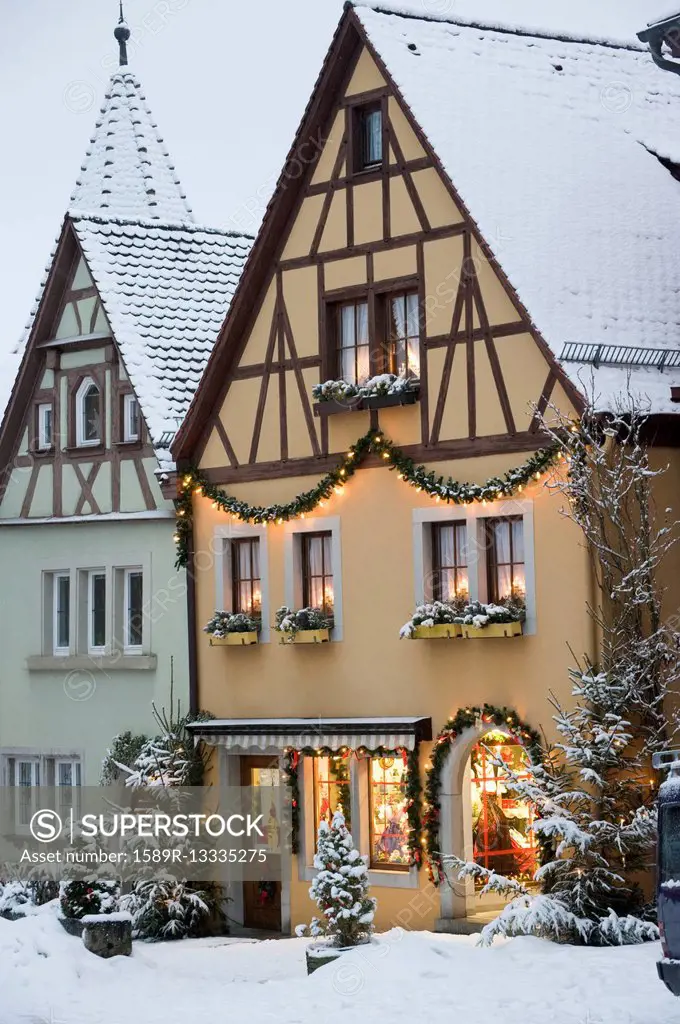 Quaint, snow covered village decorated for Christmas