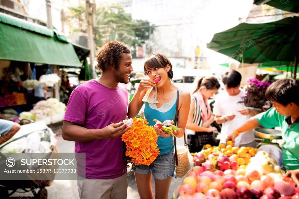 Couple shopping in outdoor market, Bangkok, Bangkok, Thailand