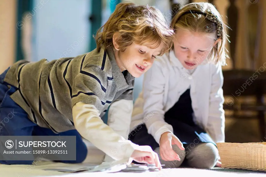 Children working together on floor in classroom