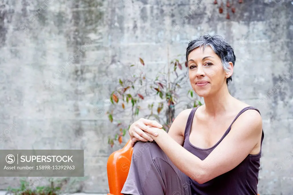 Older Caucasian woman sitting outdoors