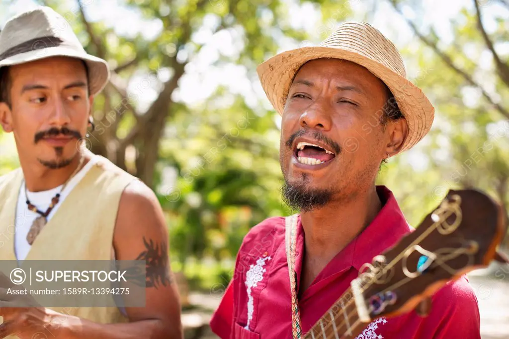 Hispanic musicians performing in park