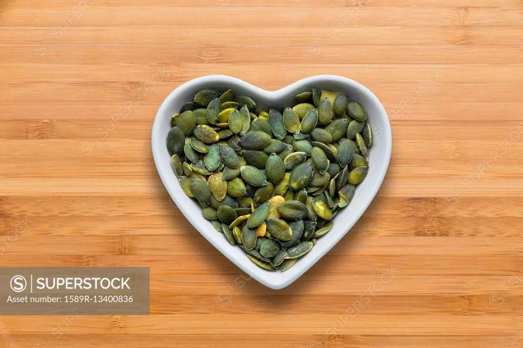 Heart-shaped bowls of heart-healthy seeds