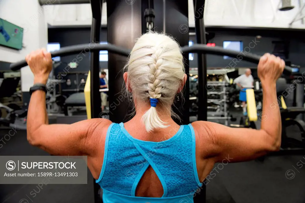 Older woman working out in gymnasium