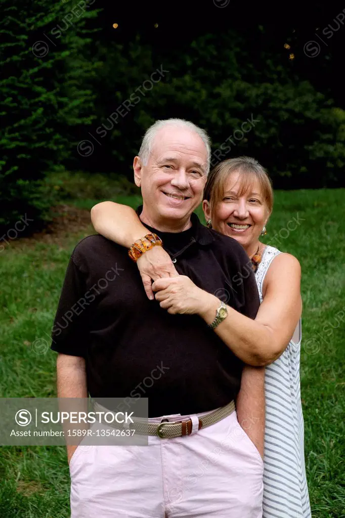 Portrait of smiling Caucasian couple outdoors