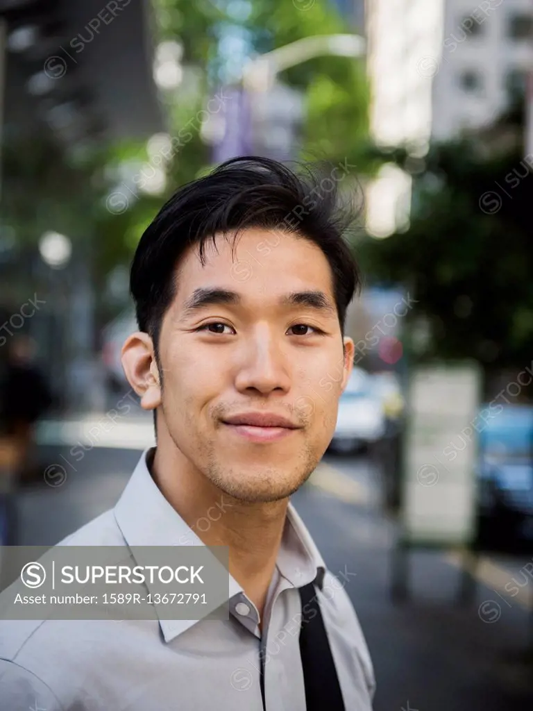 Portrait of smiling Chinese businessman