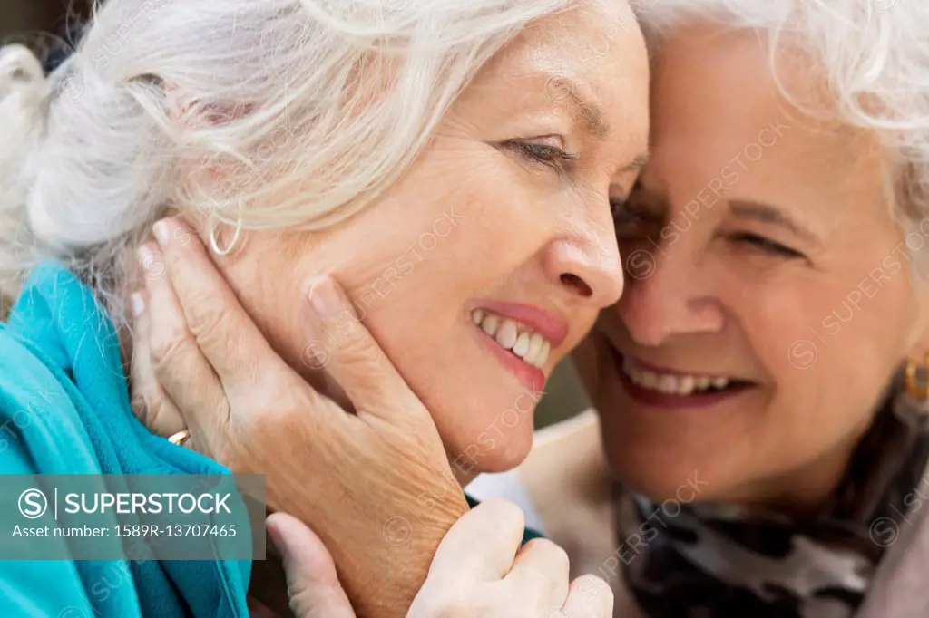 Caucasian women embracing