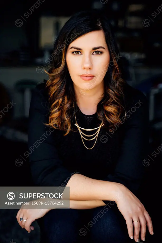 Portrait of serious Mixed Race woman