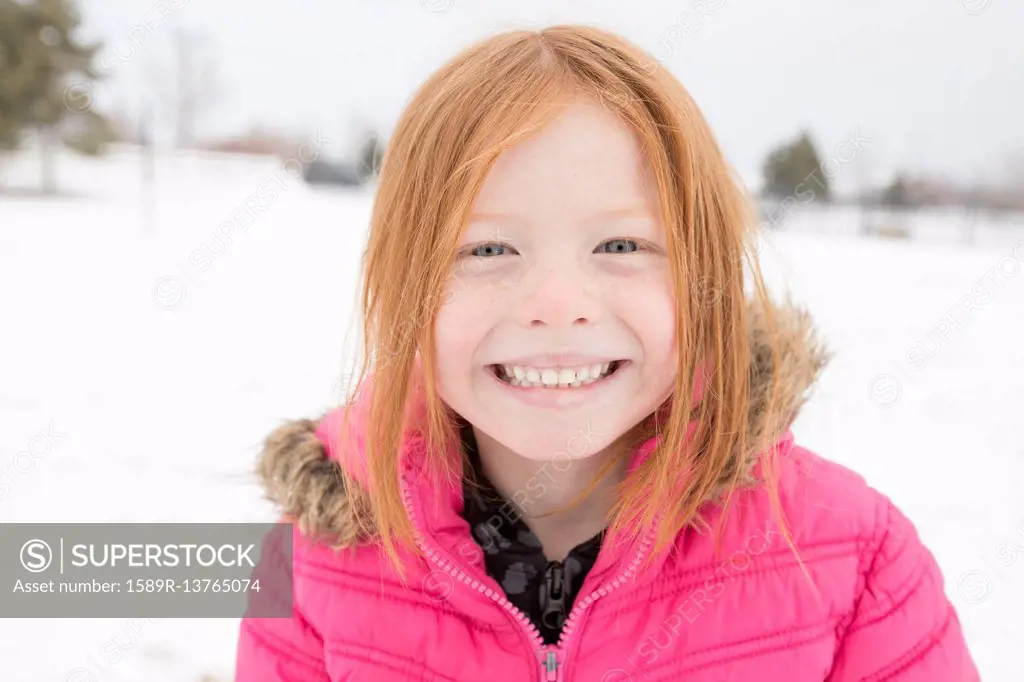 Portrait of smiling girl in winter