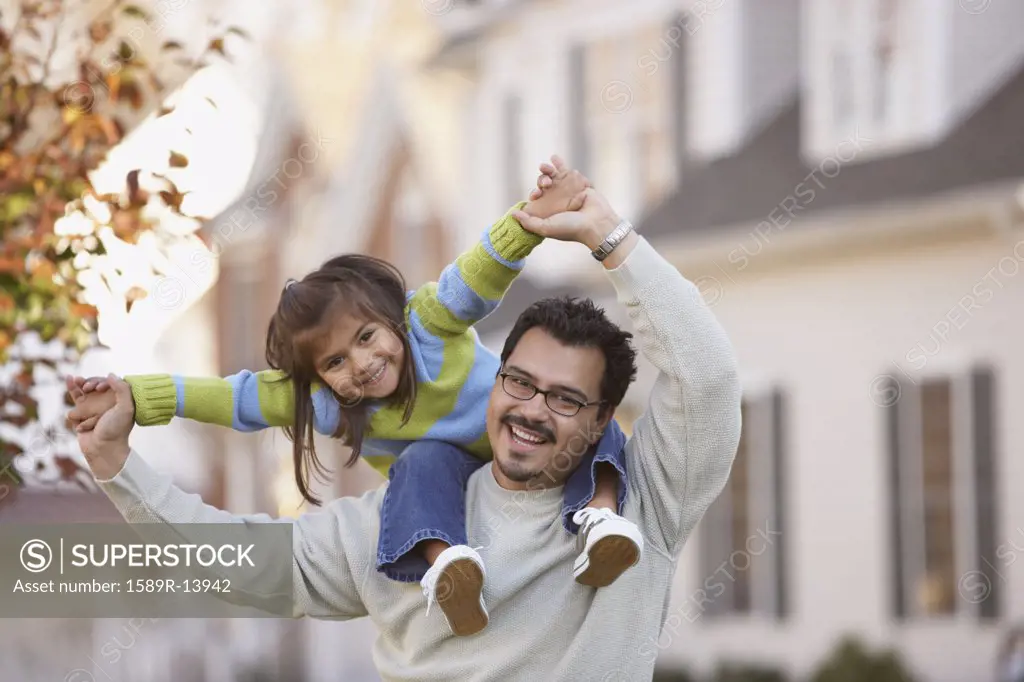 Portrait of father and daughter