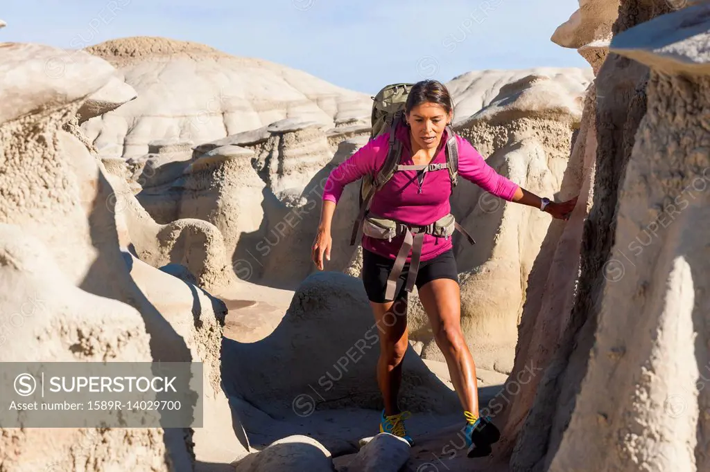 Native American woman hiking in desert