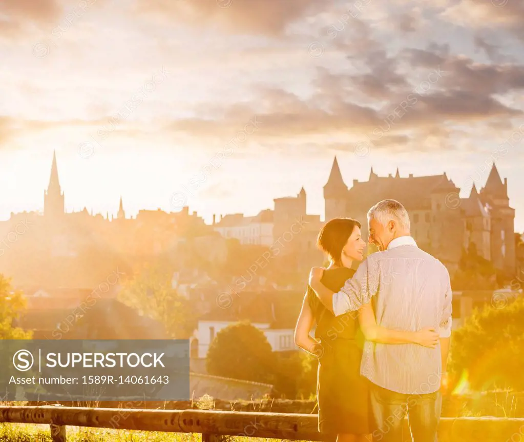 Caucasian couple enjoying scenic view