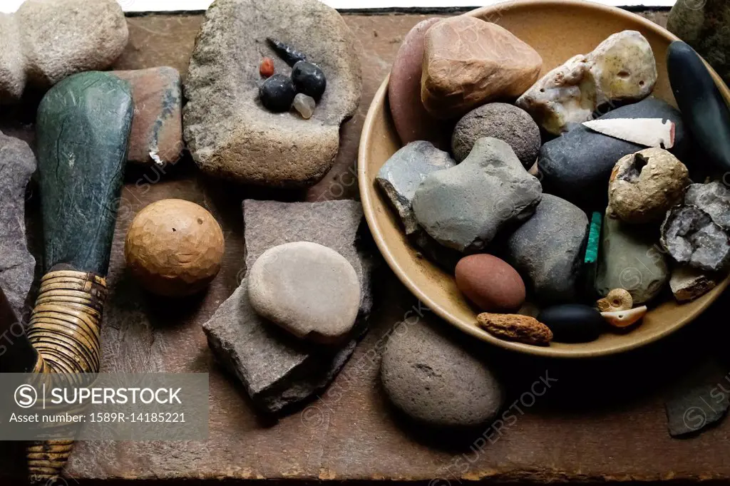 Stones in bowl and traditional tools