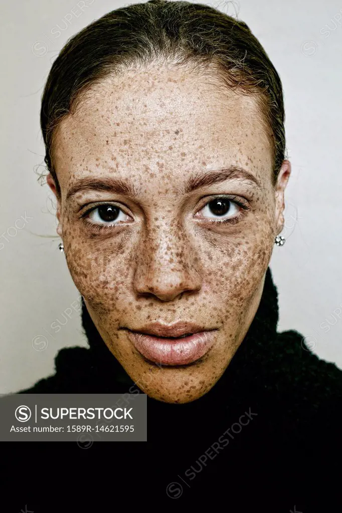 Close up of serious mixed race woman