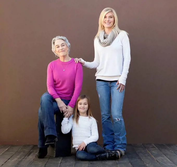 Three generations of Caucasian women smiling together