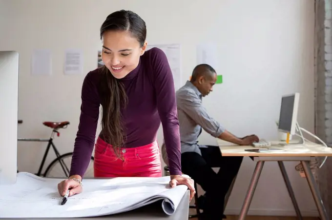 Architects working in office