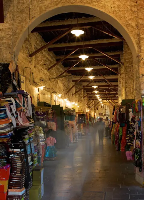 Blurred view of people shopping in indoor market