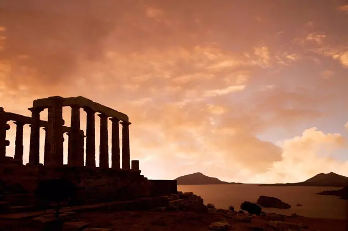 Temple of Poseidon under sunset sky, Cap Sunion, Greece