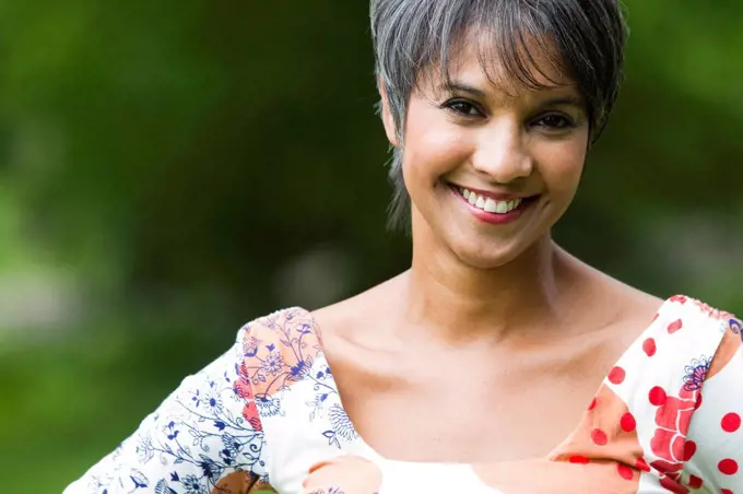 Smiling mixed race woman