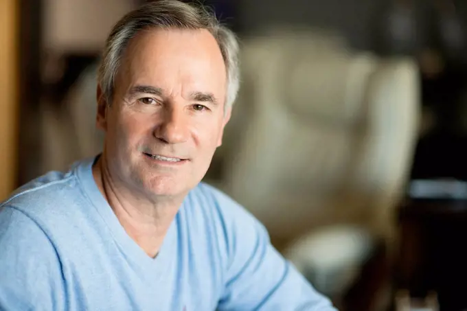 Close up of older Caucasian man smiling