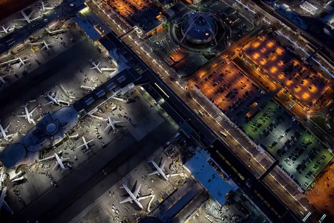 Aerial view of airplanes parked in airport gates