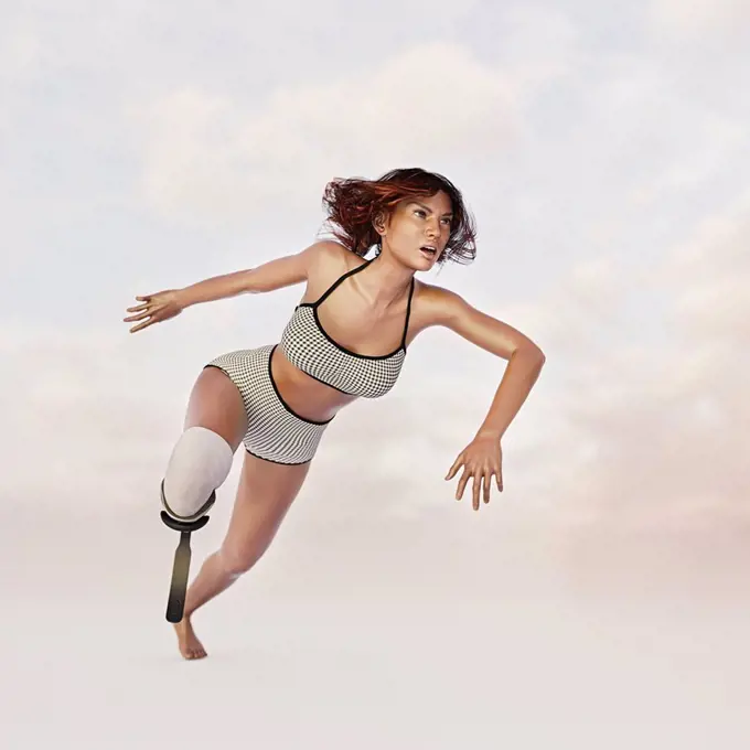 Woman running with artificial leg