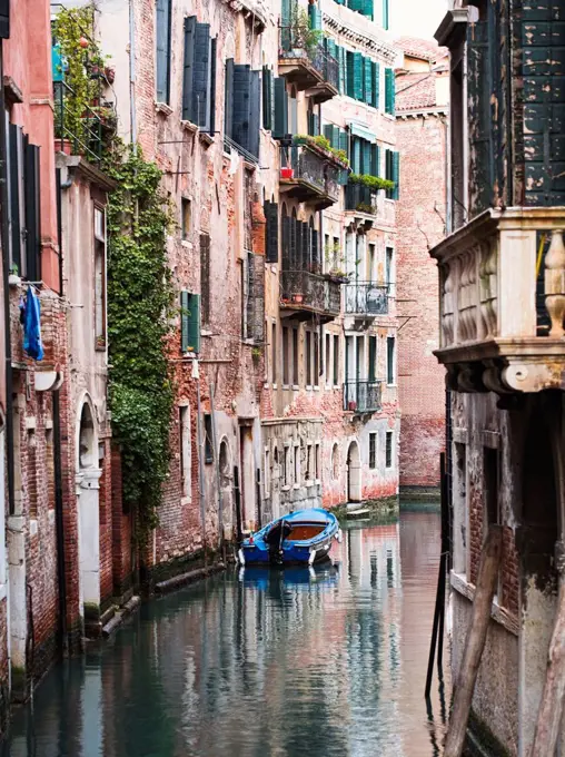 Boat moored in ornate canal