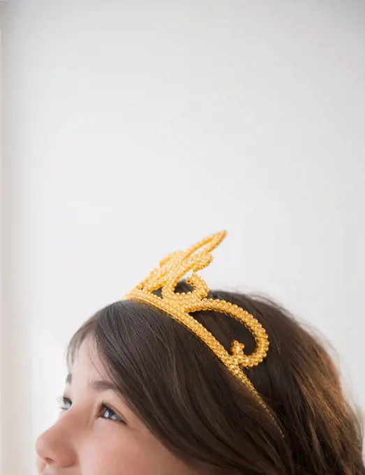 Hispanic girl wearing tiara