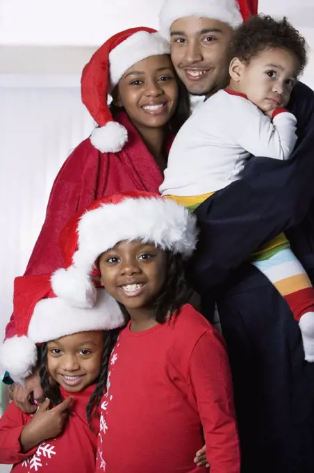 African family hugging on Christmas