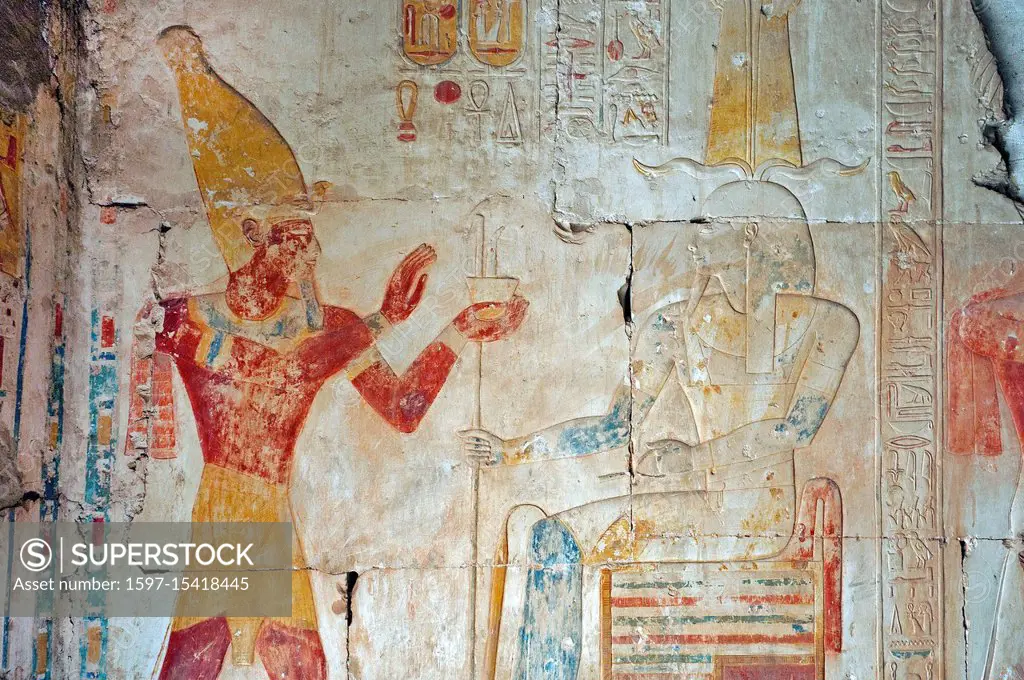 Abydos, Egypt. Temple of Usermaatra Setepenra Ramses II the Great (1303-1212 b.C.): the pharaoh worships the god Osiris.